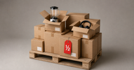 Pallet of return boxes with blender and headphones and red half-price tag