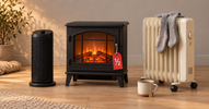 Ceramic space heater, electric fireplace and oil-filled radiator side by side with a red half-price tag