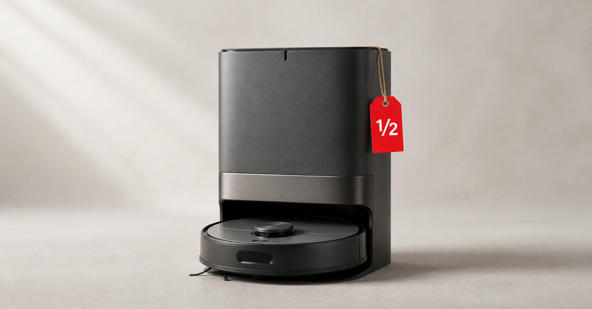 Robot vacuum on its self-empty dock with a red half-price tag — open-box robot vacuum deals in Canada