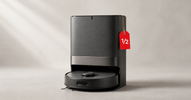 Robot vacuum on its self-empty dock with a red half-price tag — open-box robot vacuum deals in Canada