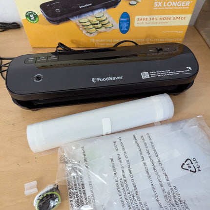 FoodSaver VS1210 Space Saving Vacuum Sealer with 1 Roll and 4 Bags