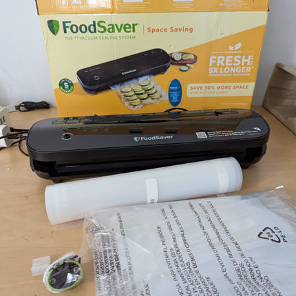 FoodSaver VS1210 Space Saving Vacuum Sealer with 1 Roll and 4 Bags