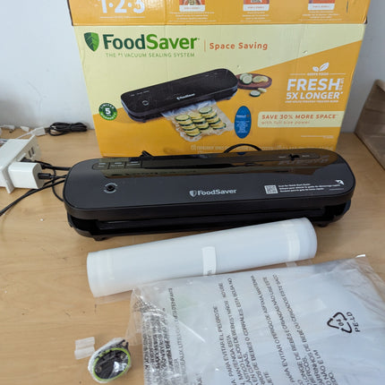FoodSaver VS1210 Space Saving Vacuum Sealer with 1 Roll and 4 Bags