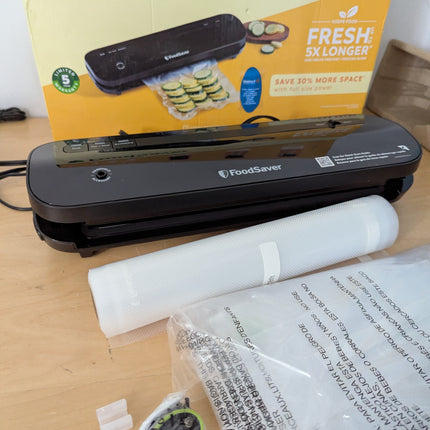 FoodSaver VS1210 Space Saving Vacuum Sealer with 1 Roll and 4 Bags
