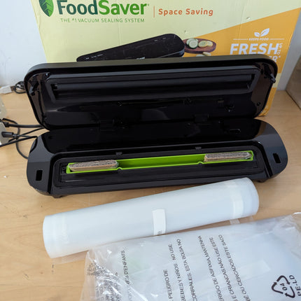 FoodSaver VS1210 Space Saving Vacuum Sealer with 1 Roll and 4 Bags