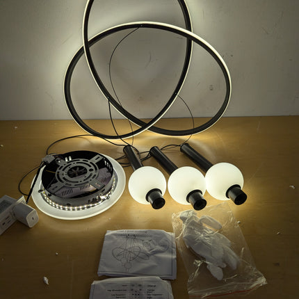 Actual unit: Becailyer LED chandelier rings lit, with globes, canopy, gloves and manuals