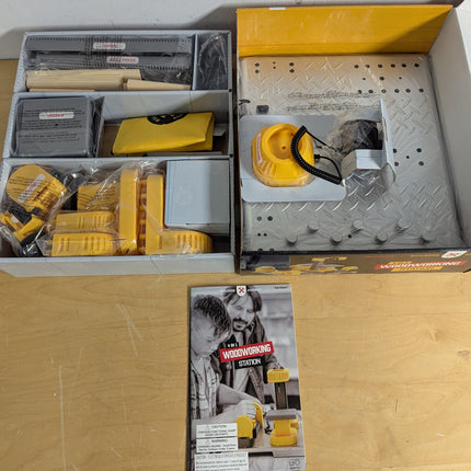 Actual unit: box contents with tools, wood pieces and guide