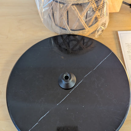 Actual unit: black marble base with natural white vein