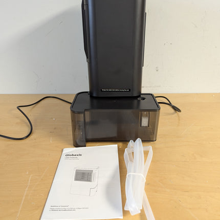 Actual unit: Globexis rotary dehumidifier with drain hose and manual
