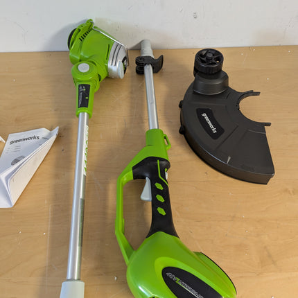 Greenworks STF305 40V string trimmer, tool only — head, shaft, handle, guard and manual laid out