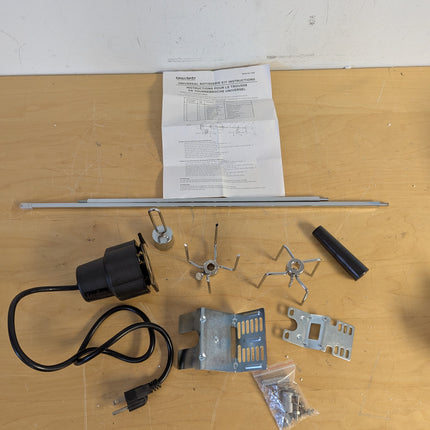 Actual unit: GrillSpot rotisserie kit with motor, spit rod, forks and brackets