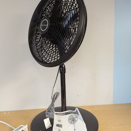 Actual unit: Lasko 1827 pedestal fan with instruction manual