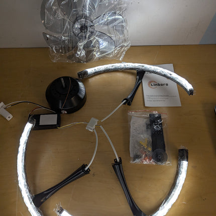 Actual unit: Linboro ceiling fan with LED rings lit, blades and remote in bags