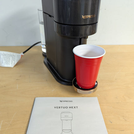 Actual unit: Nespresso Vertuo Next by De'Longhi, black with rose gold
