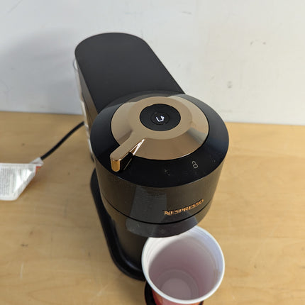 Actual unit: Nespresso Vertuo Next by De'Longhi, black with rose gold