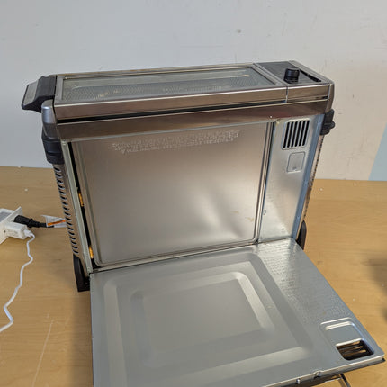 Actual unit: Ninja Foodi SP101C flipped up with the rear panel open