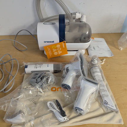 Actual unit: oneisall LM2 grooming vacuum with clipper, combs and tools