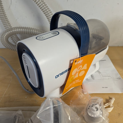 Actual unit: oneisall LM2 grooming vacuum with clipper, combs and tools