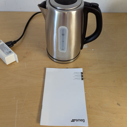 Actual unit: Salton JK1903 stainless steel cordless kettle on its power base