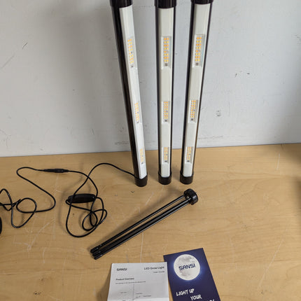 Actual unit: SANSI grow light sections, tripod and manual